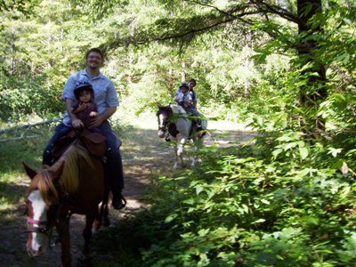 Lynn (1-1/2) & Jonathan riding Spot and David (4) & Tonia riding Hawk.