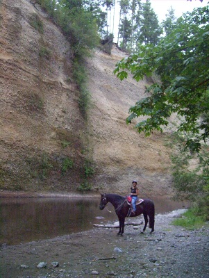 Debi riding her horse Diva.